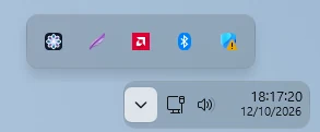 The tray with the clock and the hidden icons menu